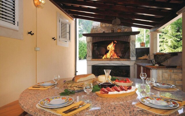 Nice Home in Kastel Novi With Sauna, Wifi and 4 Bedrooms