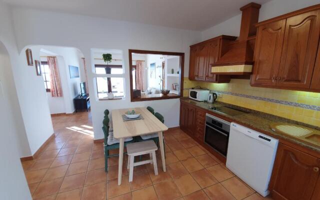 2 bedroom villa 'The Bungalow' with private heated pool.