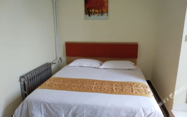 Penglai Xinlang Business Hotel