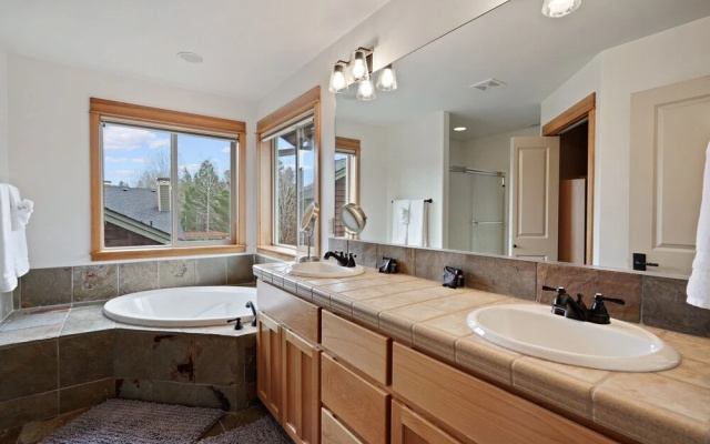 Professionally Decorated Shevlin Home features Private Hot Tub by RedAwning