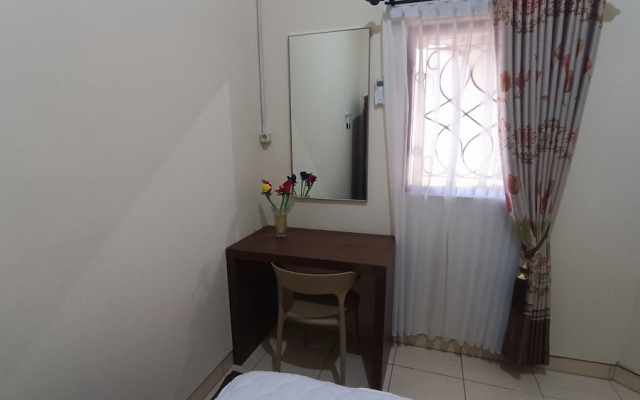 SPOT ON 93376 Roemah Ambarrukma 185 Syariah