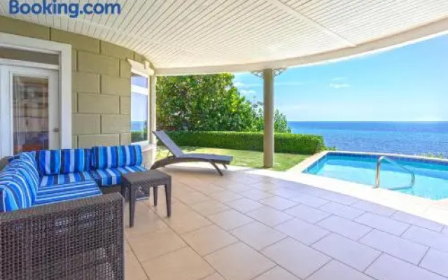 Cayman Castle & Guesthouse by Grand Cayman Villas & Condos
