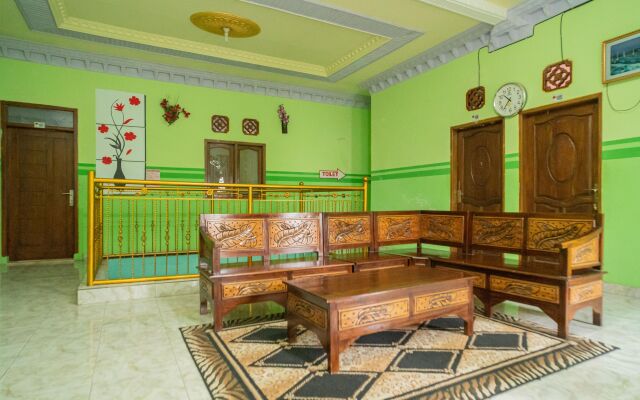 RedDoorz Syariah near Predator Fun Park Batu 2