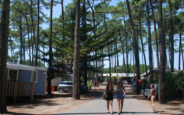 Cozy Mobile Home With Covered Terrace on a Luxury Campsite