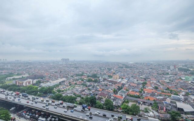 2 Bedrooms at Green Pramuka City Apartment By Travelio