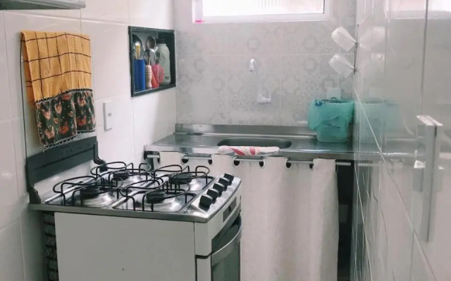 Suíte com cozinha no quintal da casa