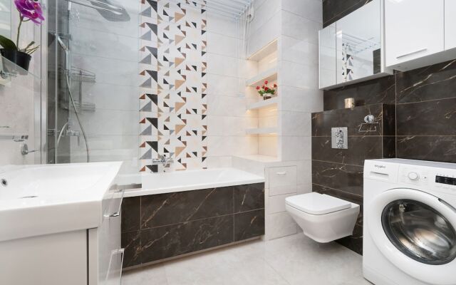 Apartment Manufaktura Łódź by Renters