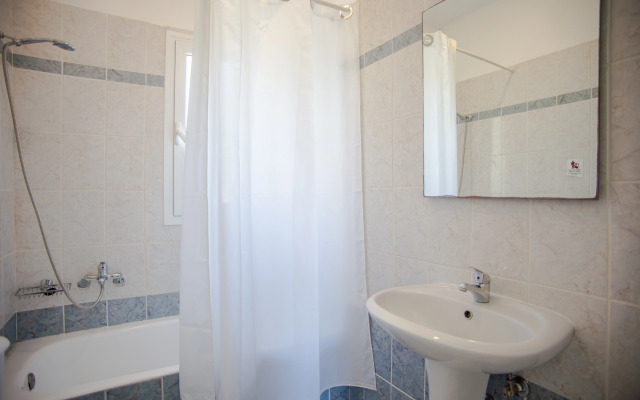 Отель Liberatos Village