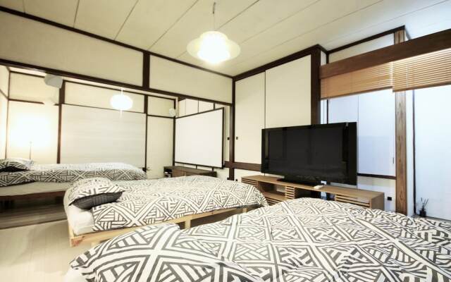 Sapporo Dome Front House