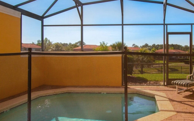 Private Screened Splash Pool Overlooking Tranquil Lake Right Beside Disney World by Florida Dream Homes