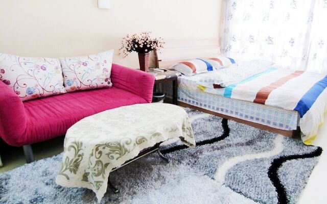 Qingdao Noah Tourist Apartment (CBD Wanda Plaza)