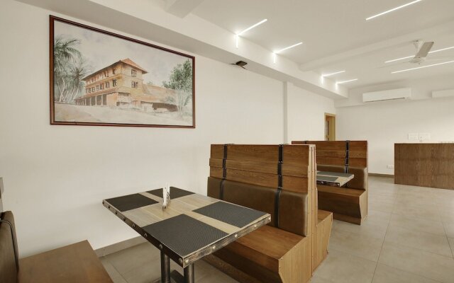 Capital O 22459 Edasserys Kalamassery Tourist Home