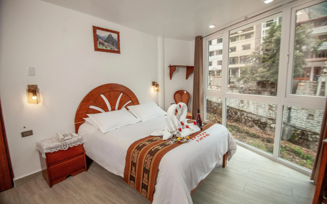 MAPILAND-Hotel Boutique. a unos pasos de la estación de tren y de autobus. Con vista al río y a las montañas