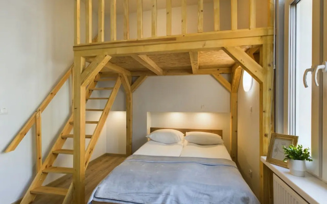 Wooden Cracow Apartment by Renters