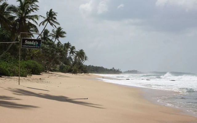 Sandy Cabanas Beach Resort