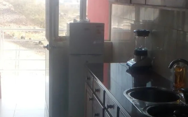 Pensão Ngozi Nova Cidade