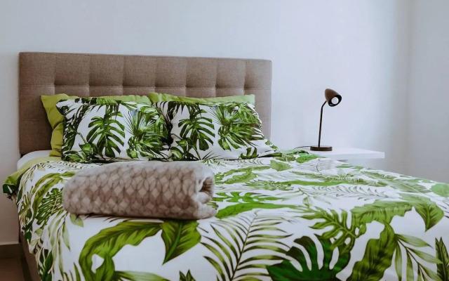 The Palm Leaf Apartments