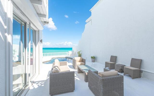 Caprice 5 -Private Beachfront Home in Gated Community