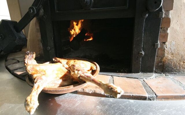 Asador H.M. Versus