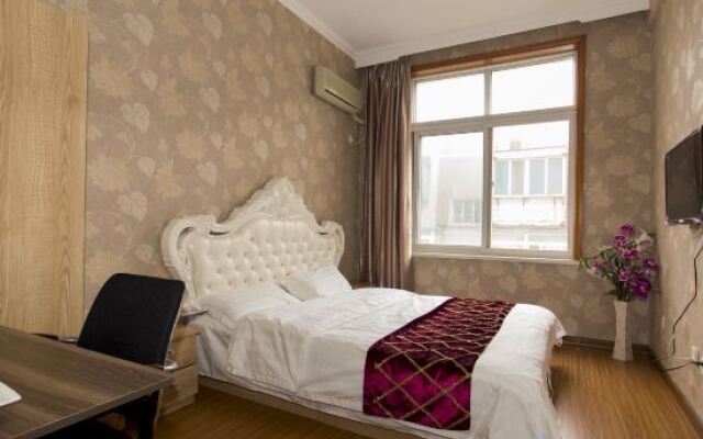 Xiaisi Lexiang Service Apartment (Dalian Xinghai Square)