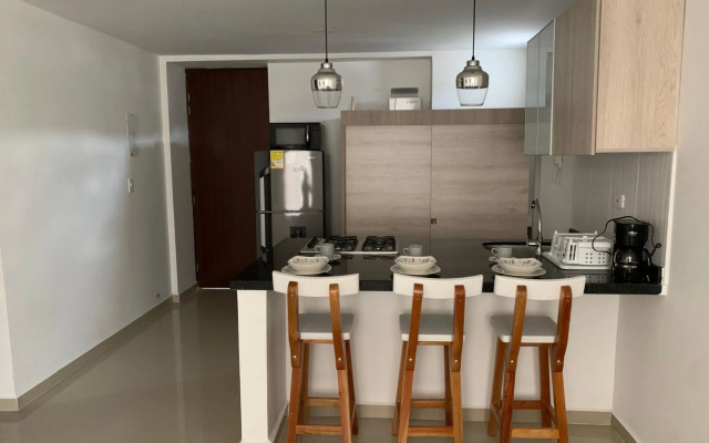 Precioso apartamento con piscina.