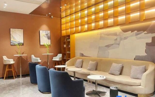 Nuojulian Hotel (Dongguan Hengli bus station)