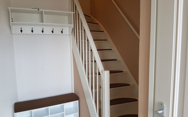 Exclusive Holiday Home Floating on a Lake in Friesland