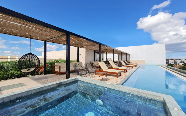 Kaab by the Beach. Condo with roofpool