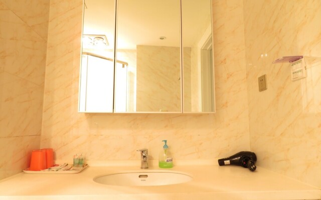 Dalian Xinglaier Apartment