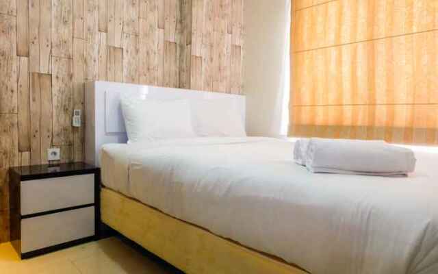 Modern 2BR with City View at Bassura Apartment By Travelio