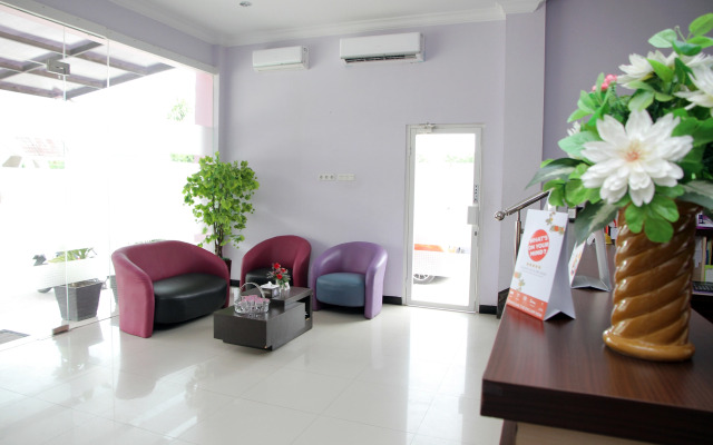 Purple Hotel by OYO Rooms