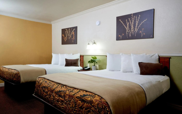 Family Garden Inn & Suites