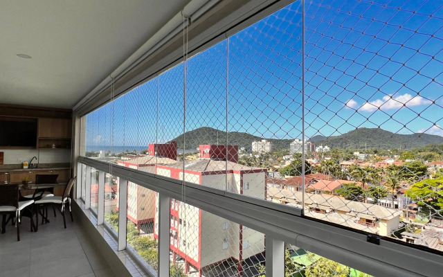 Apartamento em Bertioga com varanda gourmet