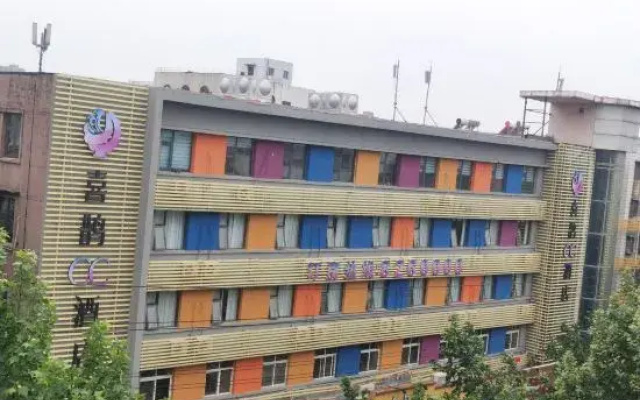 Magpie CC Hotel (Zhoukou Passenger Transport Center Yifeng Plaza)
