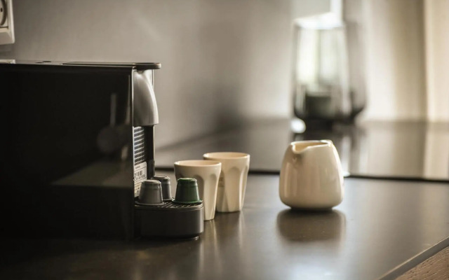 Stylish 2BR Apartment with Balcony and Urban View