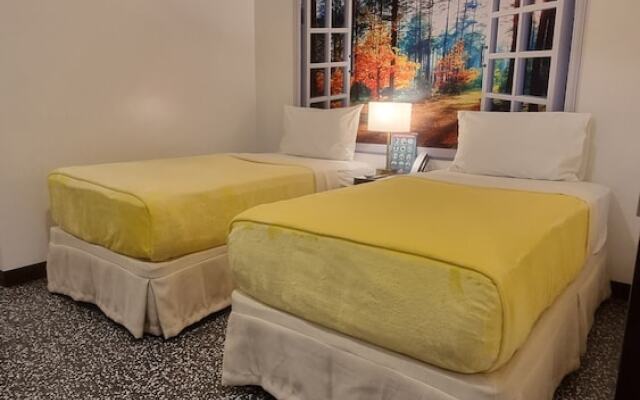 One Cristina Suites