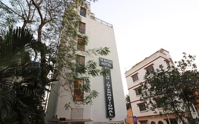Capital O 7743 Hotel Hiland International