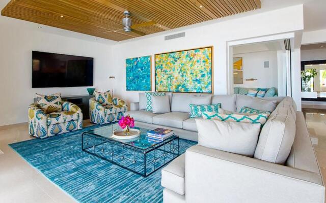 Spectacular 3-Story Beachfront Villa with a Huge Pool Patio