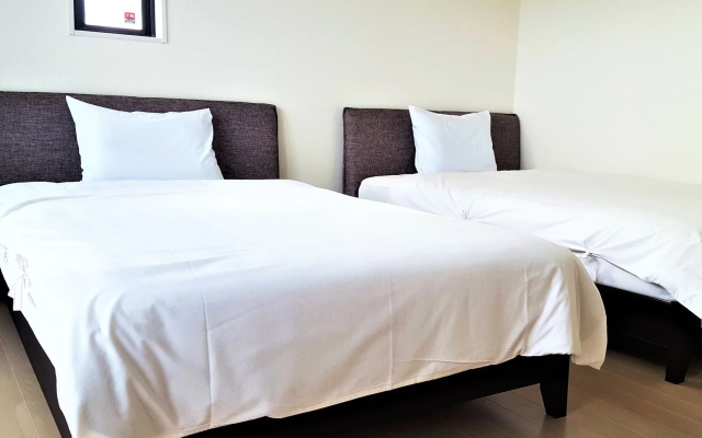Churamui Terrace – Guest Rooms – Motobu