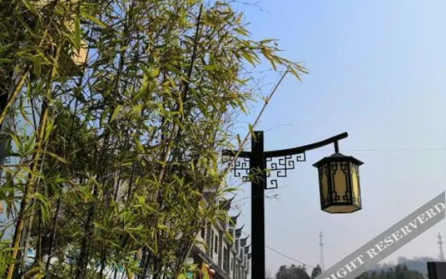 New Beacon Yunman Internation Hotel (Yingshan Tourist Center Chaxiang Small Town)