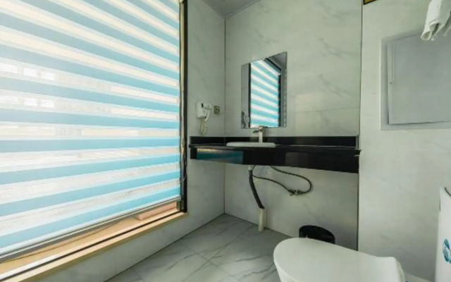 Yihai Boutique Hotel (Guangzhou Baiyun Railway Station Shijing Branch)