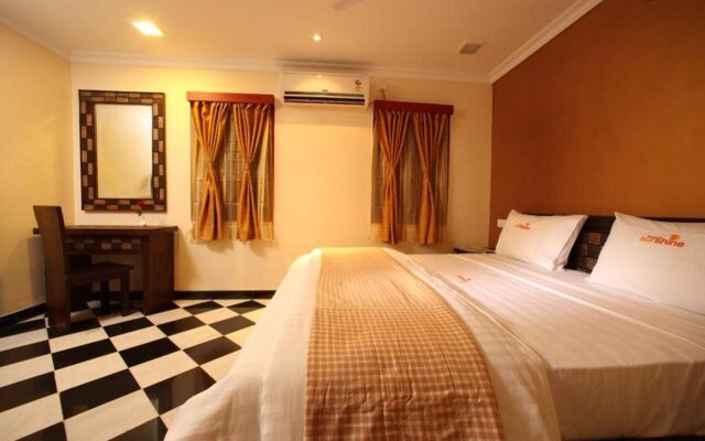 Meenakshi's Sunshine Hotel