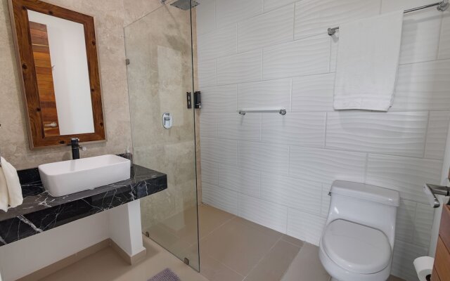 Angelina 28 Beachfront and Family Apartments - Modern and Relaxing Long Stays (20 min from Cancun Airport)