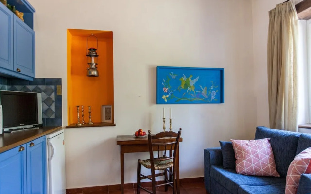 Dine on the Generous Veranda at a Rustic Stone Getaway