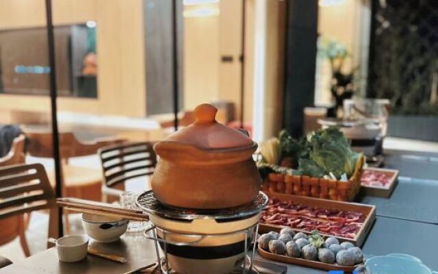 Yujian Hotel (Xishuangbanna Mengle Dafosi Branch)