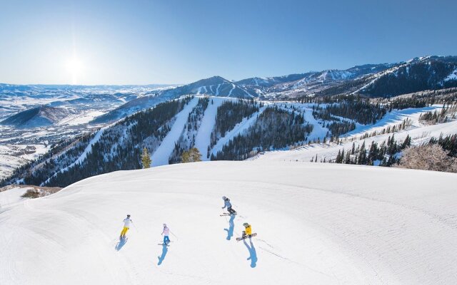 Massive Condo with Views and Rustic Furnishings by RedAwning