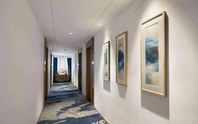 Qianna Hotel (Zhengzhou Erqi Square David City)