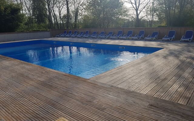 Camping Le Petit Lion - Lodges Bois