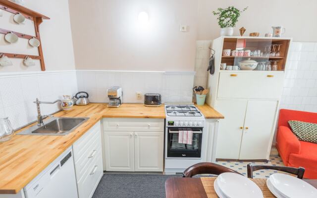 Riverside Apartment With A Balcony