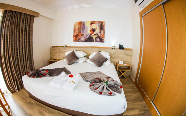Mabrouk Hotel And Suites